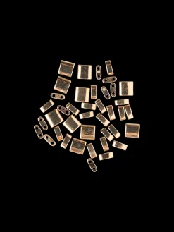 Metalliske fliseperler
